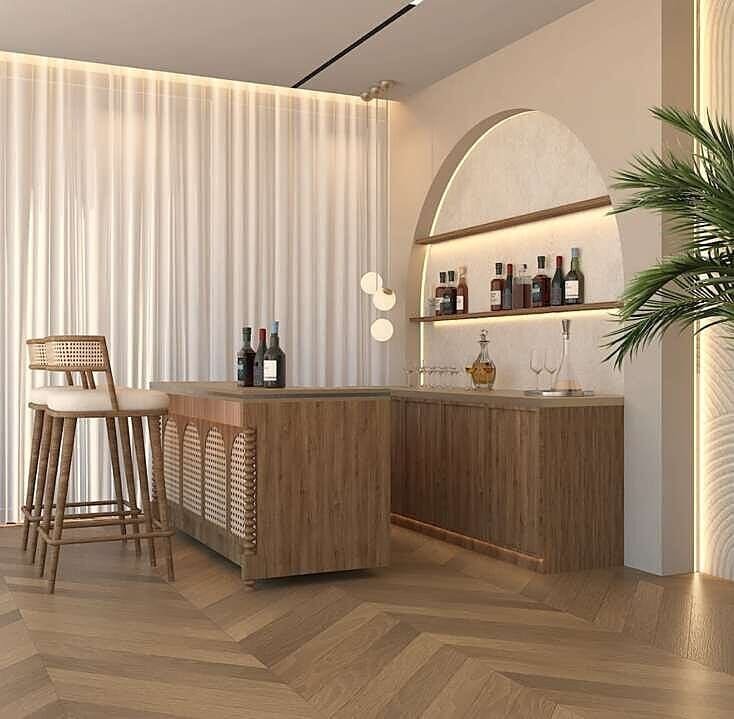 Home bar in warm timber with arched display shelving and bar stools