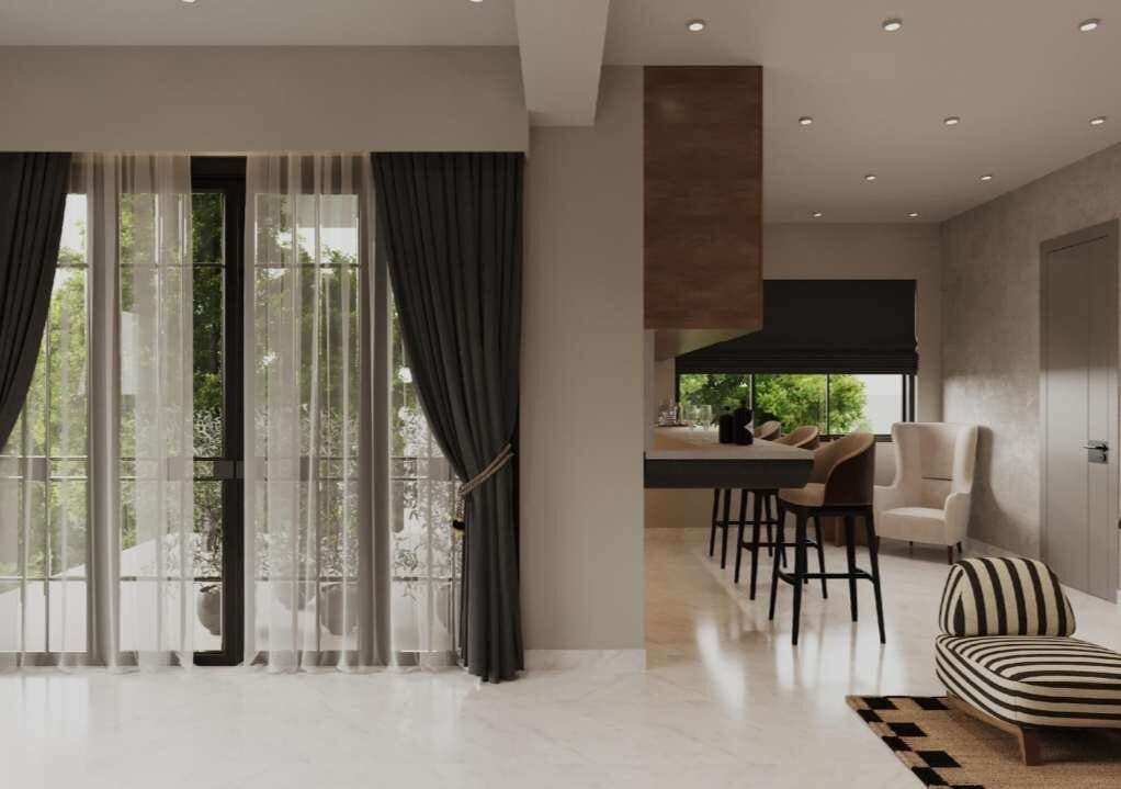 Balcony with sheer curtains and open kitchen counter beyond